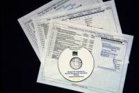Photo of IT Planning documents and CDs